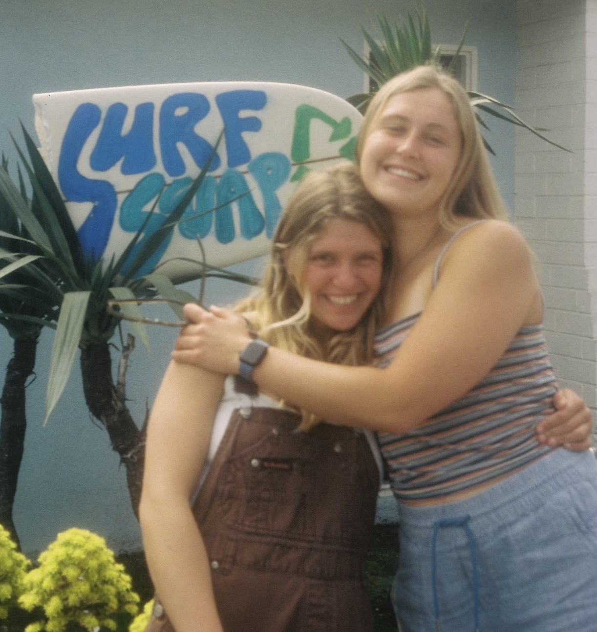Ruby and Emma, founders of Sustainable Surfers, pose at a surf swap