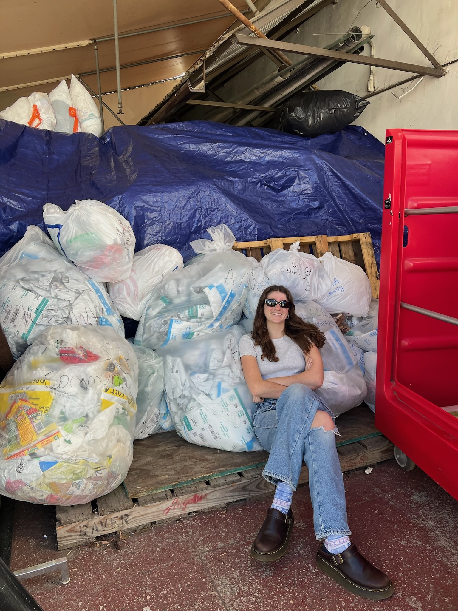 Ella with stored plastic bags