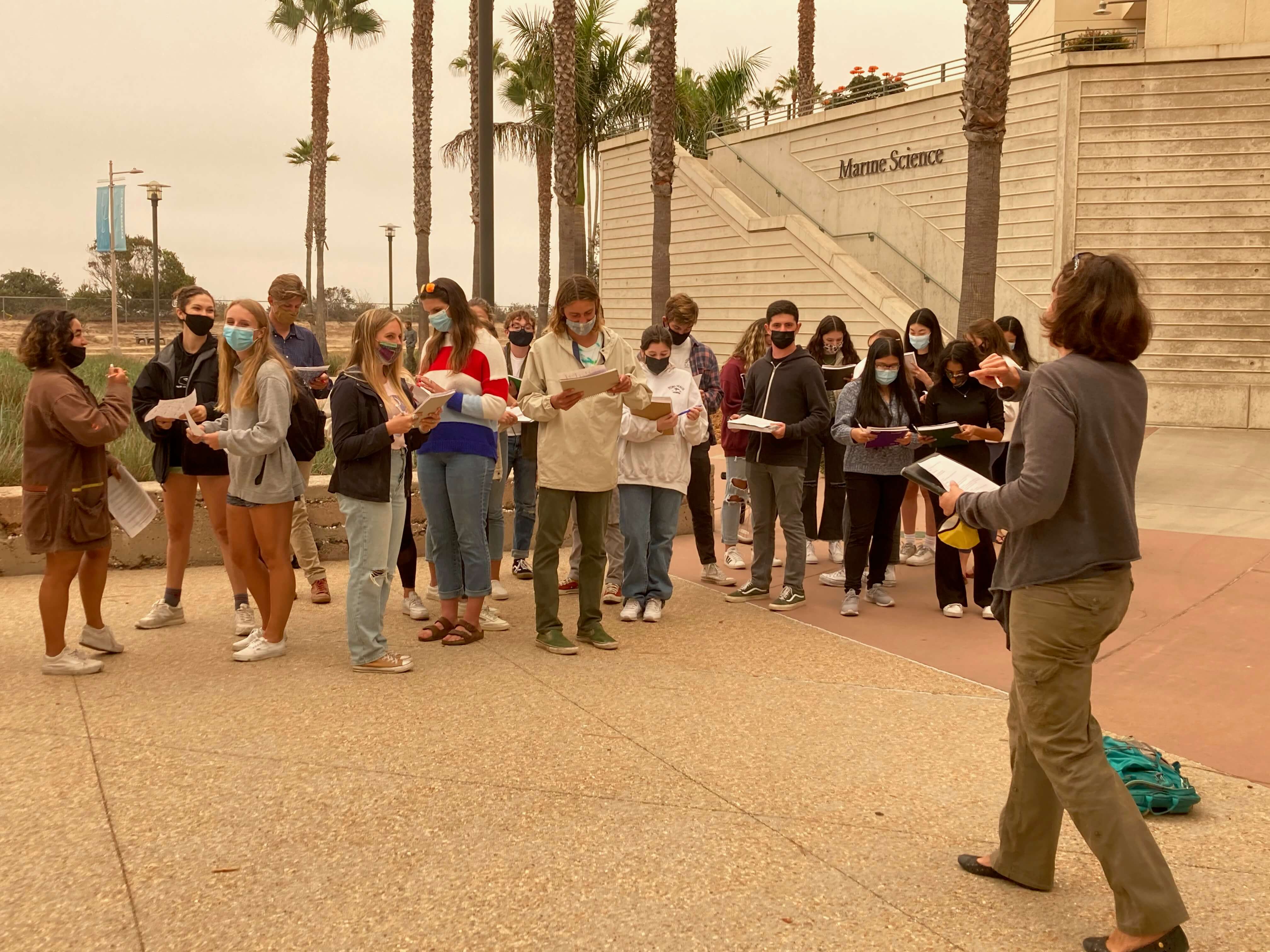 Students meeting in a group outside at UCSB