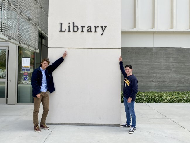 Lukas and Noah Stand in Front of the UCSB Library